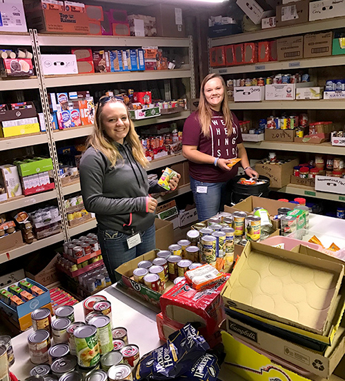 DC Service Leaders Allison White (grey sweatshirt), Defiance, Ohio; and Jenny Holbrooks (maroon shirt), Oakwood, Ohio