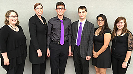 Six members of honors band dressed in black