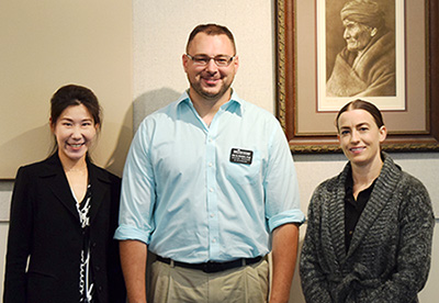 Dr. Namporn Thanetsunthorn, assistant professor of business, Dr. James Sliwinski, assistant professor of psychology, and Beverly Fanning-Simmons, assistant professor of design. Not pictured is Dr. Christopher Cwynar, assistant professor of communication