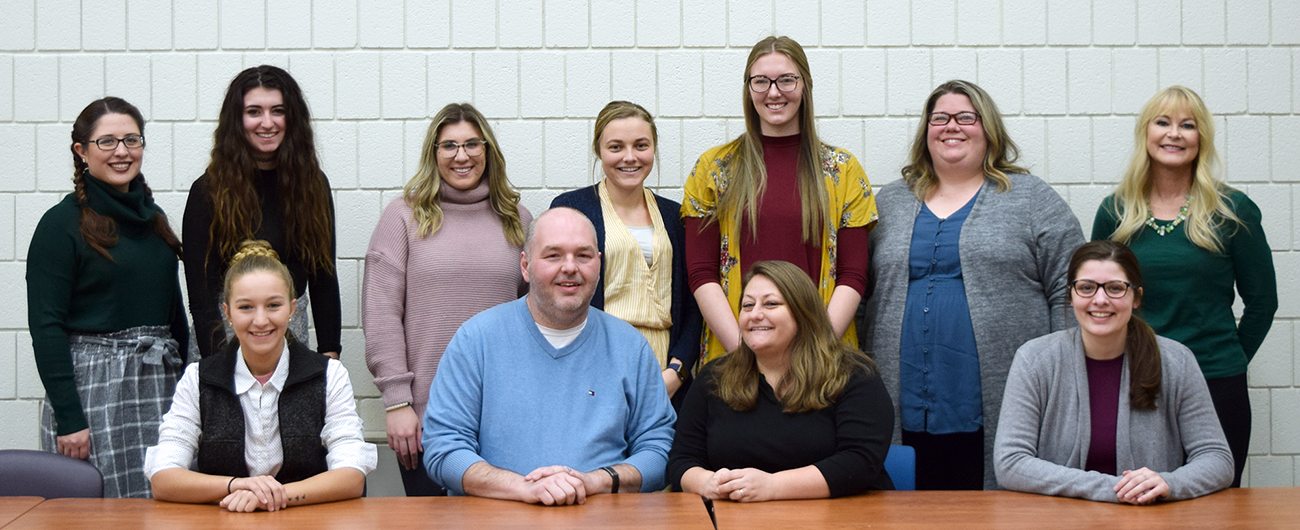 8 social work students, 2 directors of the Sanctuary shelter, and Professor Alesia Yakos-Brown